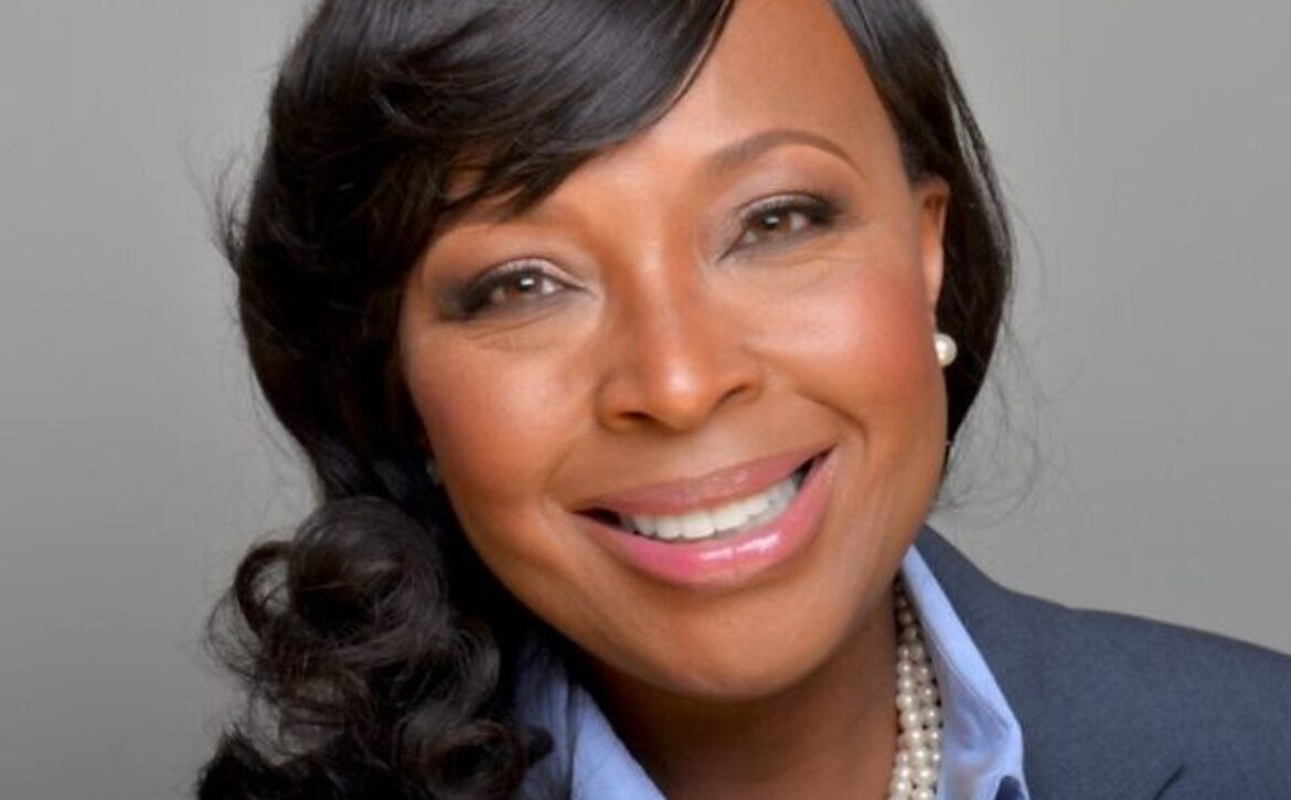 headshot blue jacket – Charise Breeden